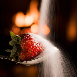 product photography tips for a strawberry with sugar photo